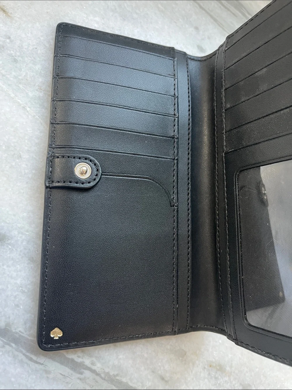 kate spade navy penguin print continental wallet with gold logo